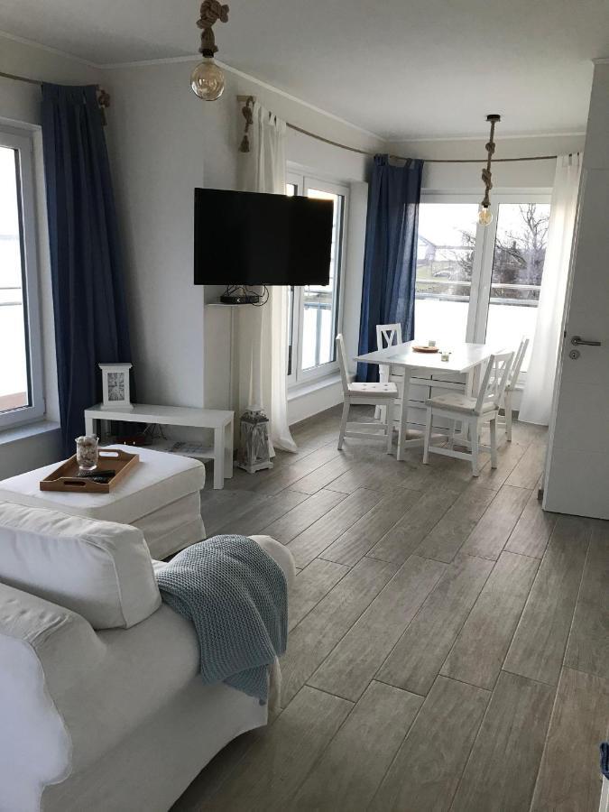 Strandhaus Appartement - Seeschwalbe Og Fehmarnsund Bagian luar foto